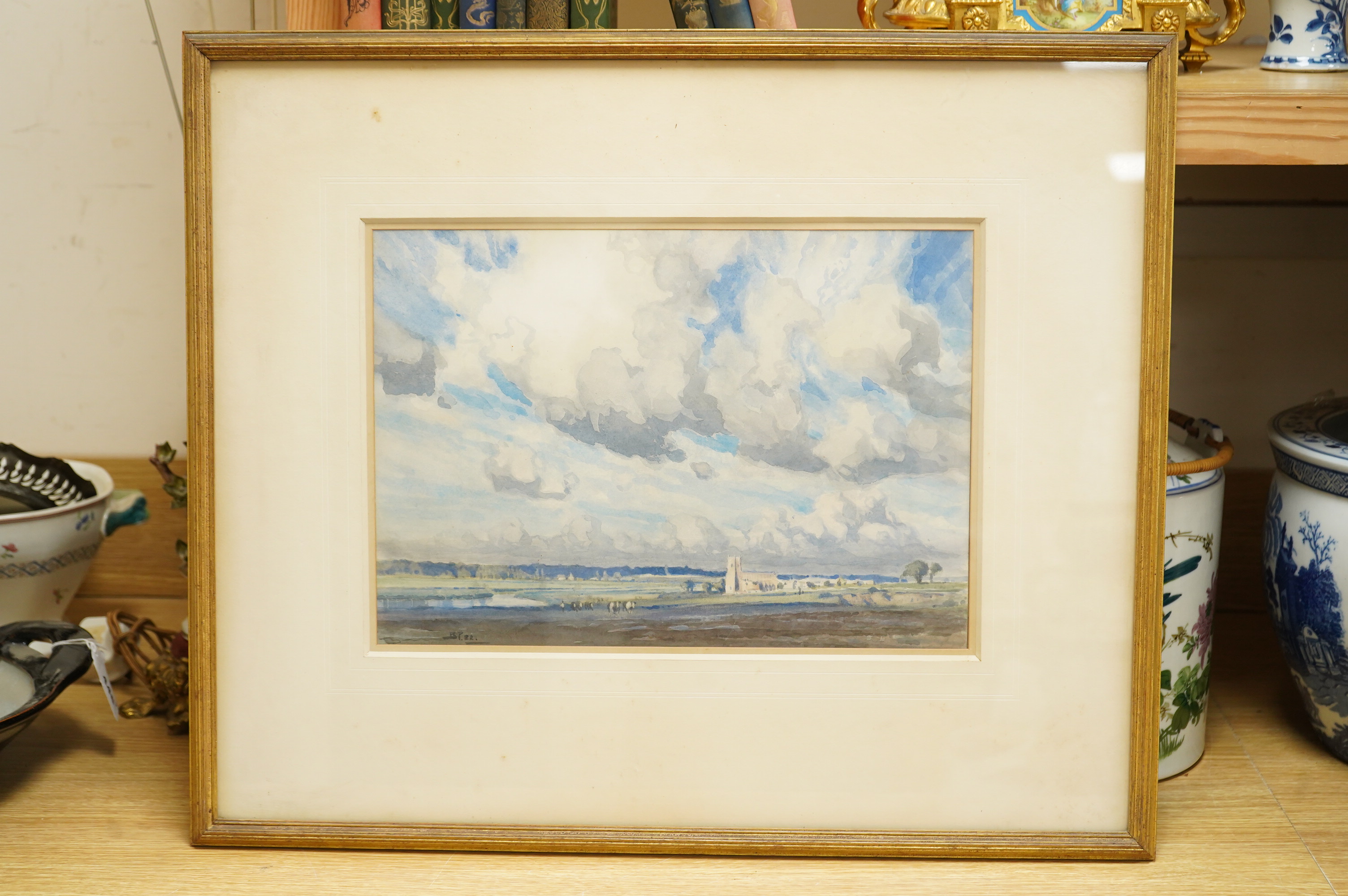 Bertram Priestman (1868-1951), Landscape with cattle grazing before church, initialled and dated '22, watercolour, 25 x 36cm